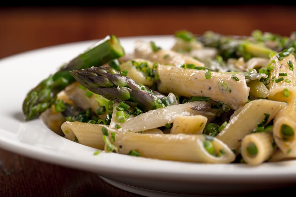 Calamarata pasta with sausage ricotta and peas + Buy